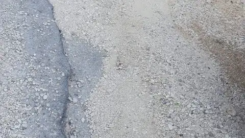 Calle en mal estado La calle el palangre en Guardamar del Segura .Cada vez que llueve el agua se lleva la arena que pone en ayuntamiento como solución.