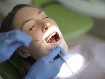 Mujer en el dentista Mujer en el dentista