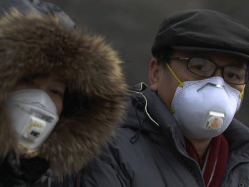 Mascarillas en Pekín frente a la alta contaminación
