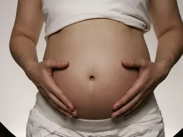 Imagen de archivo de una mujer embarazada Imagen de archivo de una mujer embarazada